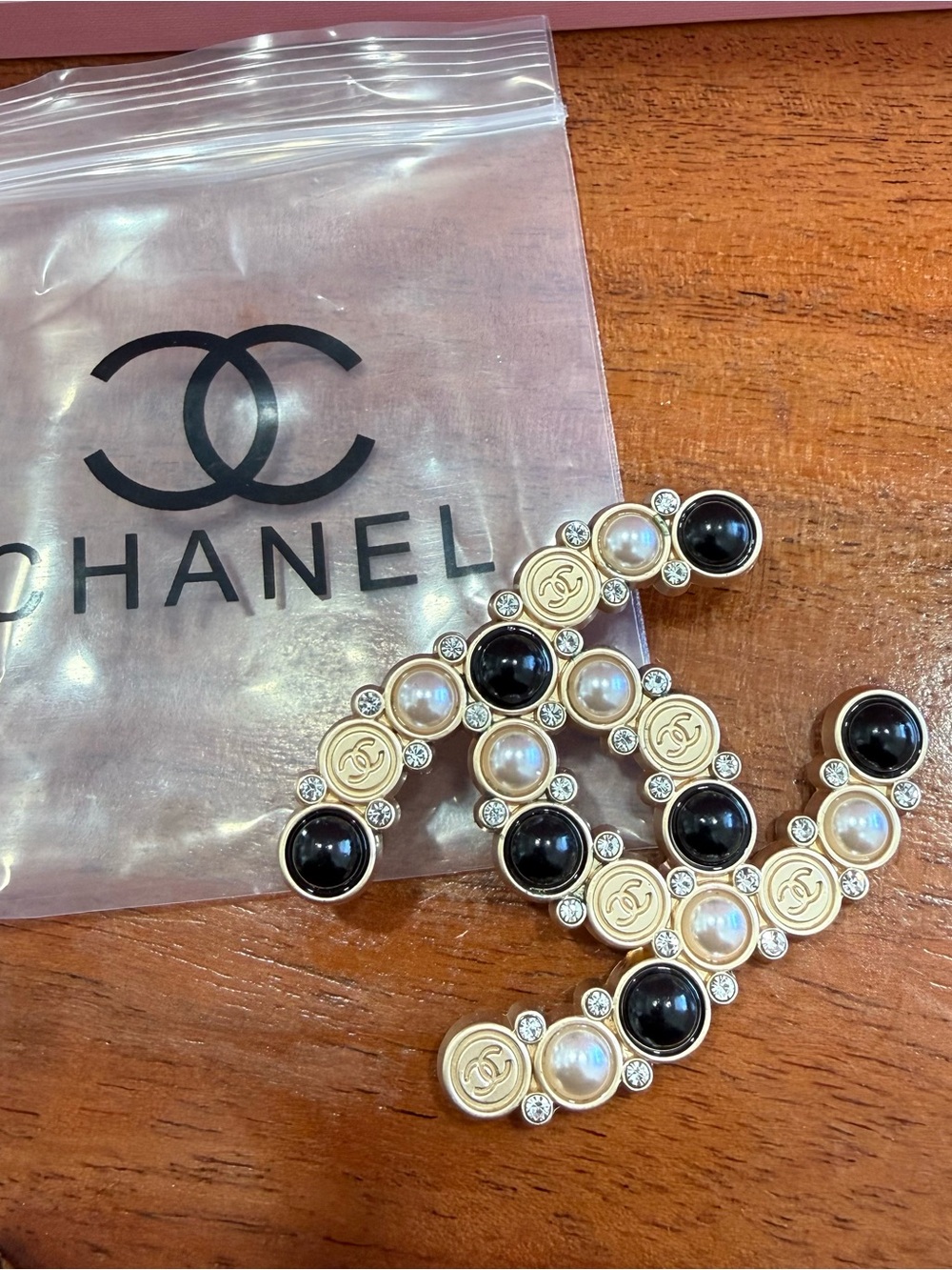 Upcycled CC Gold Tone Double CC Brooch with Black and Pearl Accents